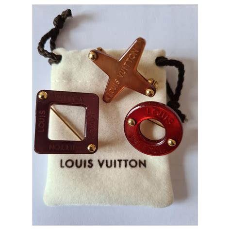 broches louis vuitton|Louis Vuitton necklace set.